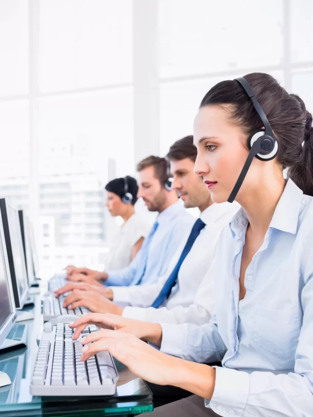 business-colleagues-with-headsets-using-computers (1)