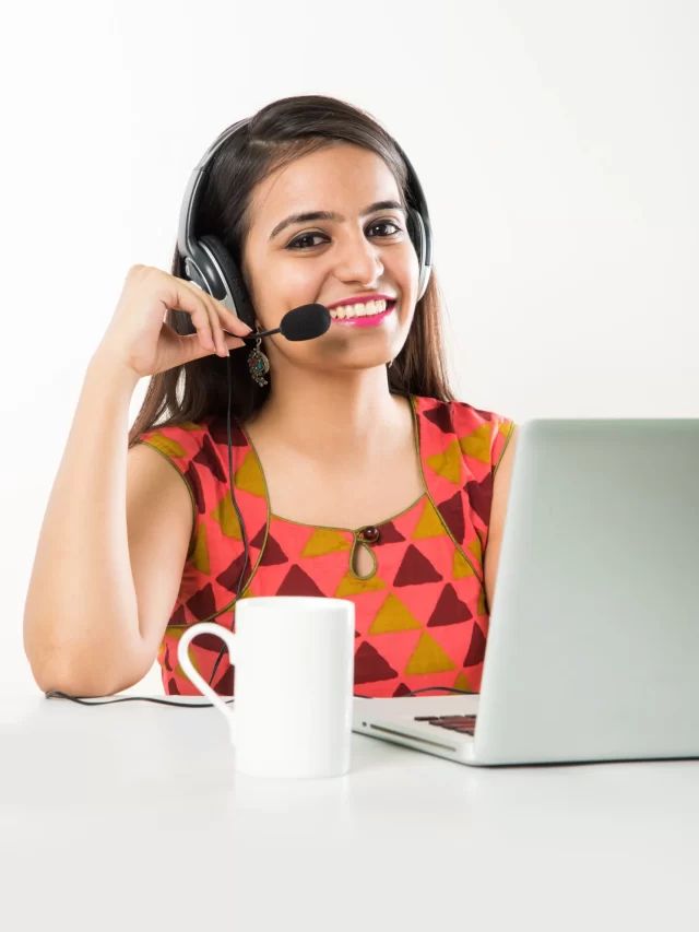 pretty-indian-asian-girl-bpo-call-centre-employee-speaking-headphone-with-laptop-table